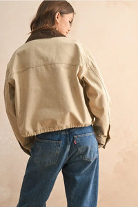 Beige oversized canvas collar contrasted utility jacket with patch pockets and button closure