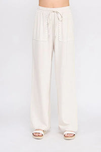 Beige drawstring palazzo linen pants with scallop trim from Bow Embroidered Linen Pants collection
