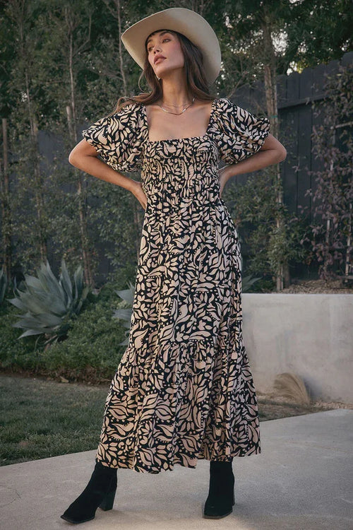 Black and beige floral print Evra Maxi Rayon Ruffle Dress with puff sleeves and square neckline