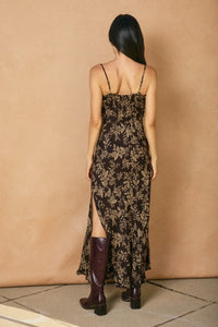 Black floral tie slit maxi dress with spaghetti straps and burgundy block-heel boots