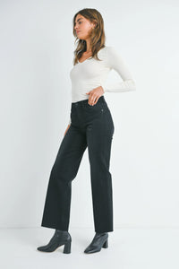 Slim palazzo denim: black high-waisted straight-leg jeans with button fly