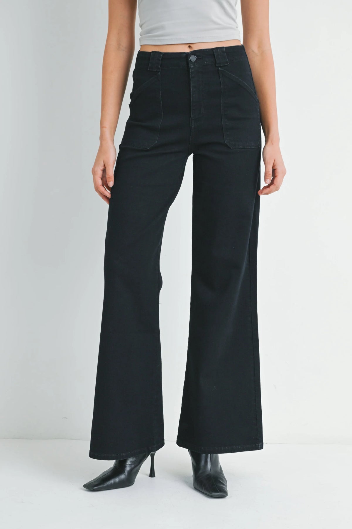 Black high-waisted wide leg flare denim jeans with patch pockets and front pockets