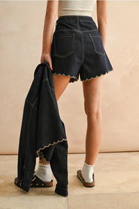 Black scallop embroidery shorts with white socks and brown sandals