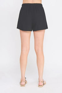 Black scalloped shorts with linen blend elastic and crochet lace details