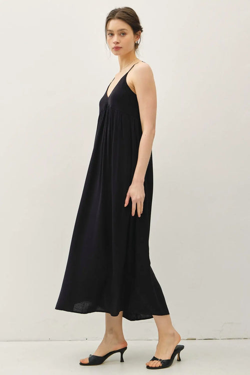 Black spaghetti strap dress from the BREEZY BABY DOLL MAXI DRESS collection, perfect for womenās boho chic clothing on Shop Daisy