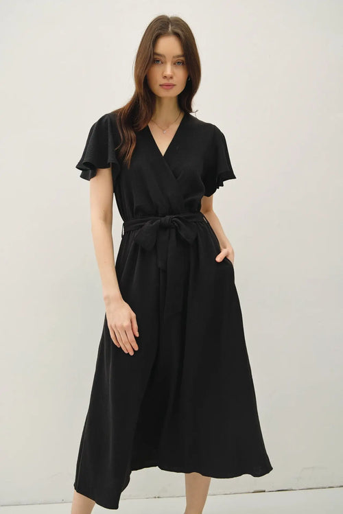 Black wrap dress with ruffle cap sleeve and V neck tie waist for elegant style