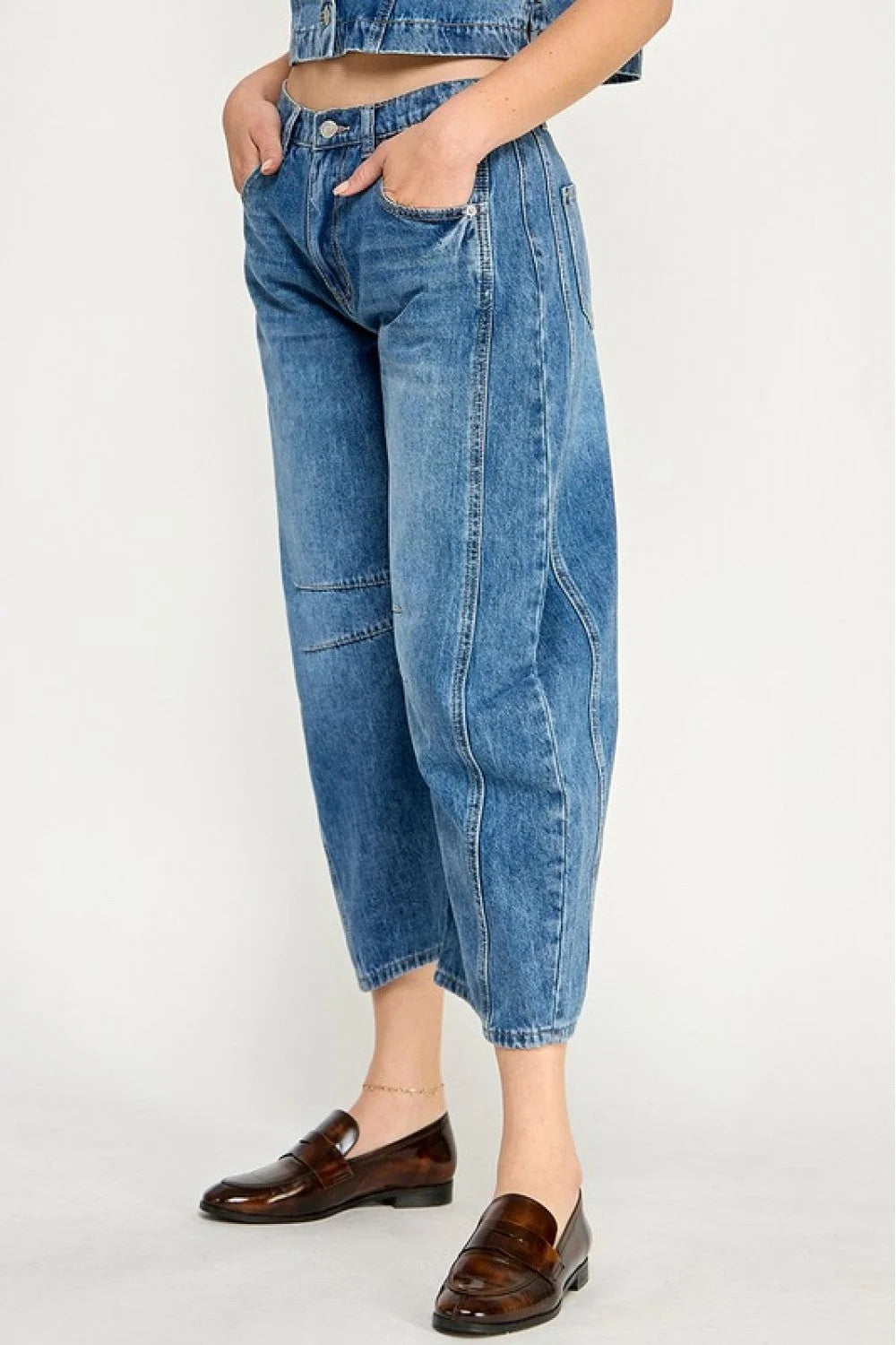 Blue denim balloon jeans from Shop Daisy’s MID-RISE BARREL JEANS collection, perfect for women’s boho chic clothing