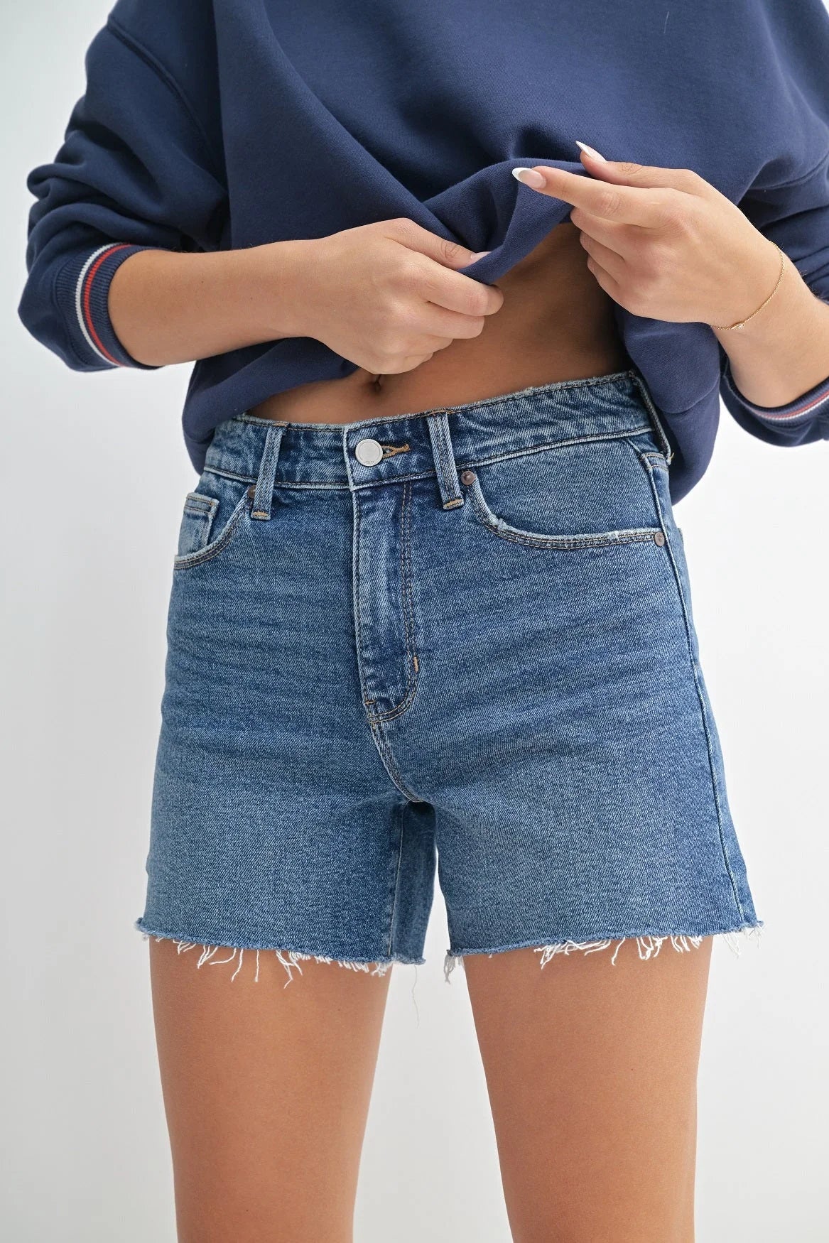 Blue denim walking shorts with longer length for comfortable casual wear