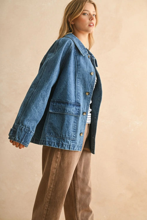 Blue denim casual jacket with large pockets and button closures for a stylish denim casual look