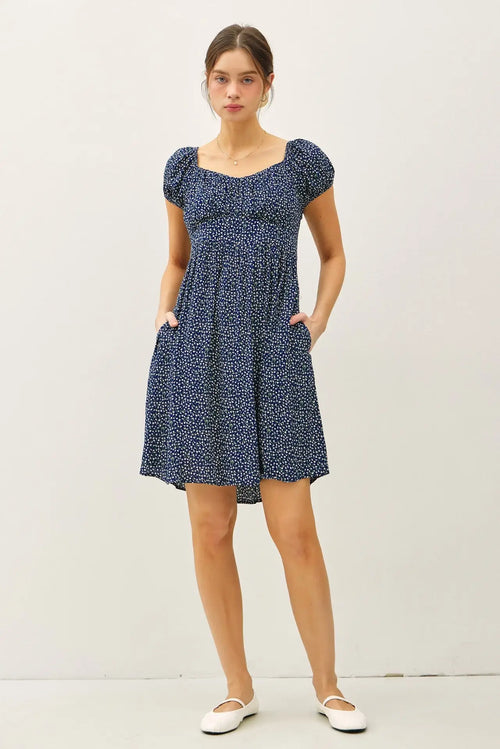 Blue floral print mini dress showcasing womenās boho chic clothing style