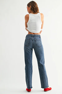 Blue full length straight denim jeans with red heel accents