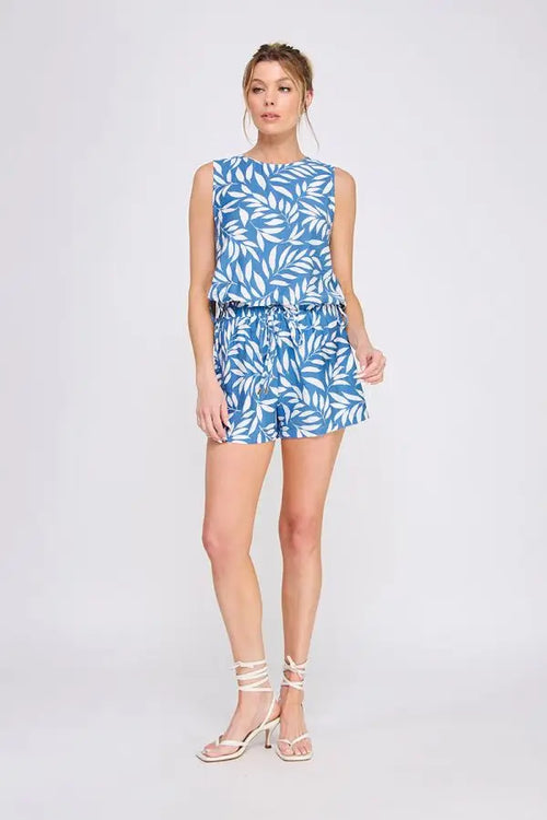Blue and white leaf-patterned printed woven tie shorts for stylish summer wear
