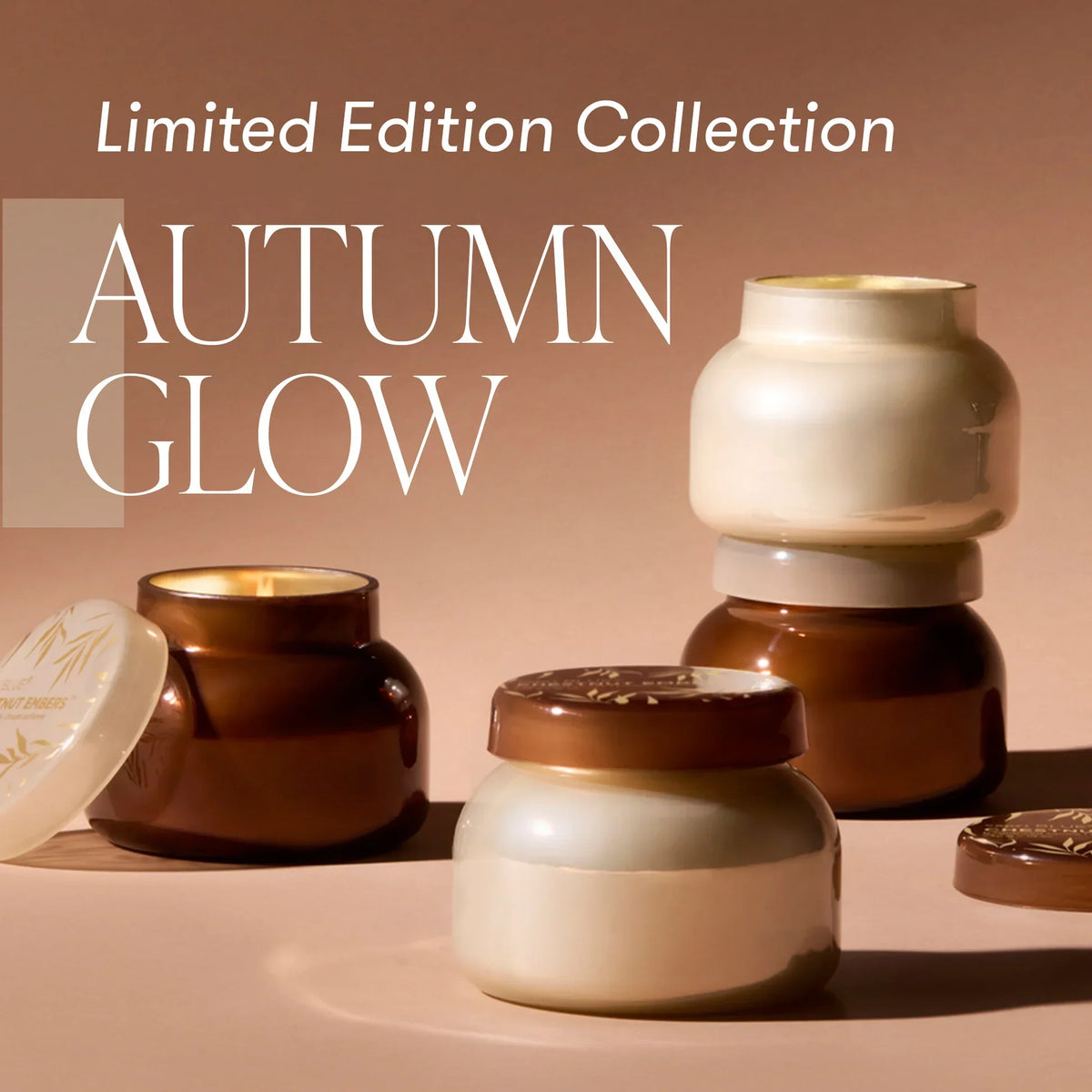 Cream-colored glass jar with brown lid featuring the Chestnut Embers Autumn Glow Signature Jar Candle