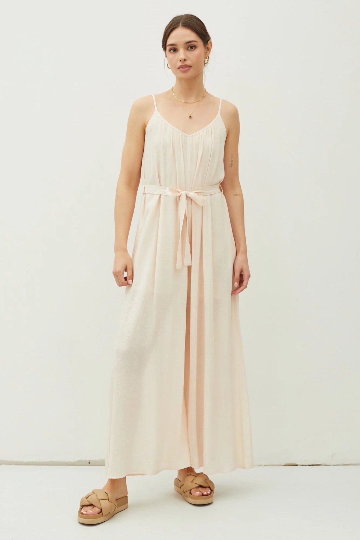 Cream-colored spaghetti strap dress from the Lightweight Tie Belt Wide Leg Cami Jumpsuit