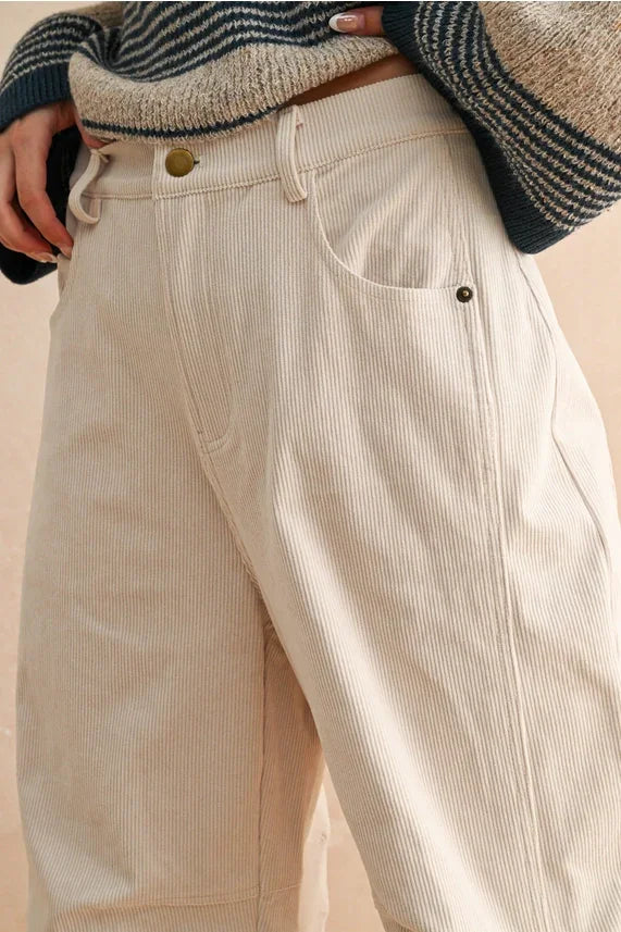 Cream corduroy barrel pants with gold buttons and drawstring waistband, inspired by UO brand