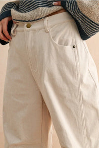 Cream corduroy barrel pants with gold buttons and drawstring waistband, inspired by UO brand