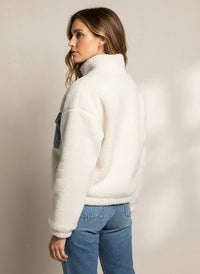 Cream Sherpa Supply Leona Jacket with black zipper and pocket details