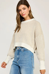 Cream and white ribbed knit balloon sleeve sweater with relaxed fit
