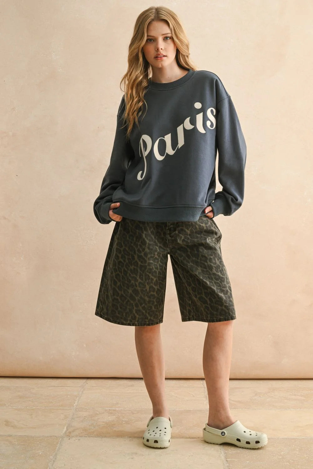 Dark gray Paris Patch sweatshirt with white script, ideal for women’s boho chic clothing from Shop Daisy