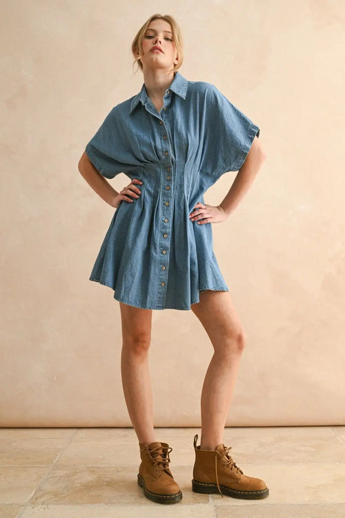 Denim button-down dress featuring pleat details, perfect as a chambray denim mini dress