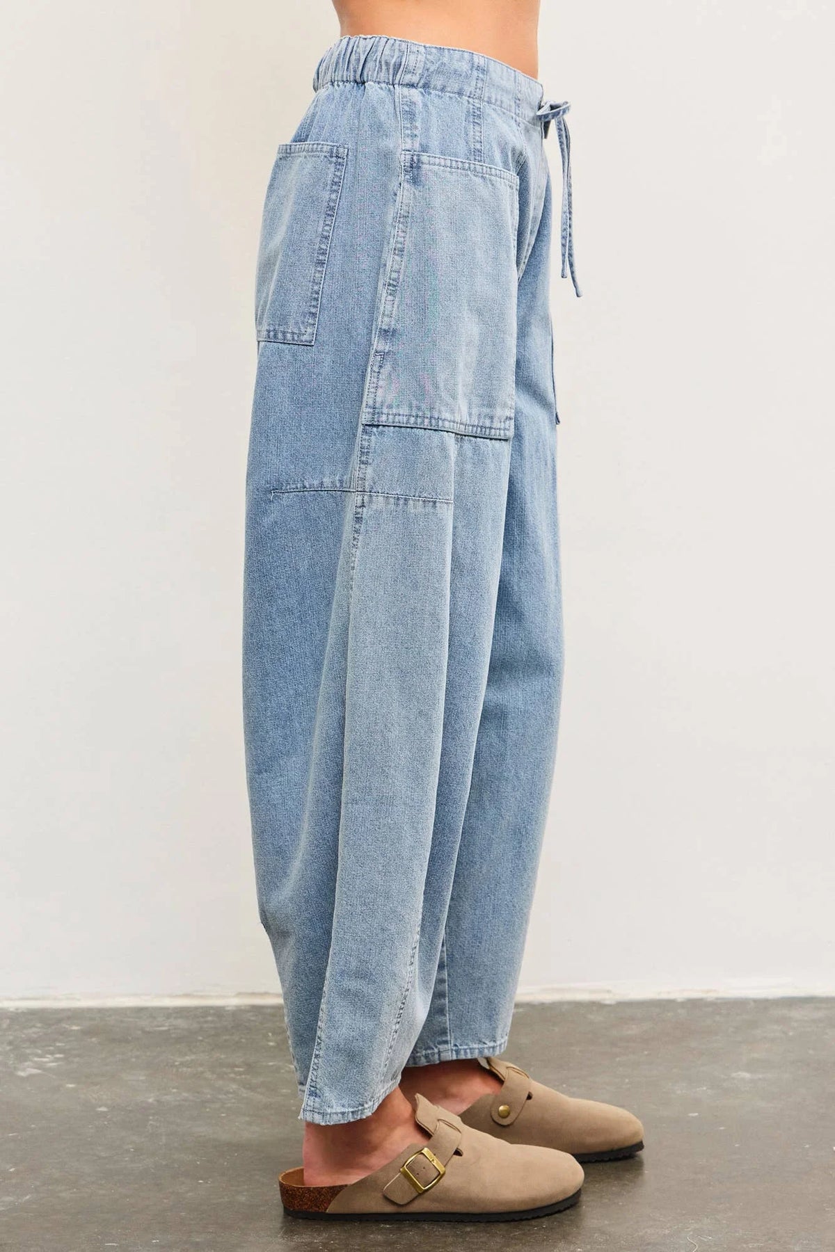 Loose-fitting denim pants from TIED FRONT SIDE SEAM DETAIL BALANCED BACK DENIM BALLOON PANTS, perfect for women’s boho chic clothing