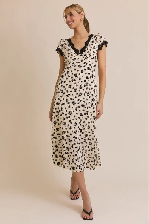 Floral midi dress with short sleeve lace trim for elegant summer occasions