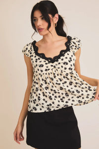 Floral print top with lace trim from Shop Daisy, perfect for women’s boho chic clothing
