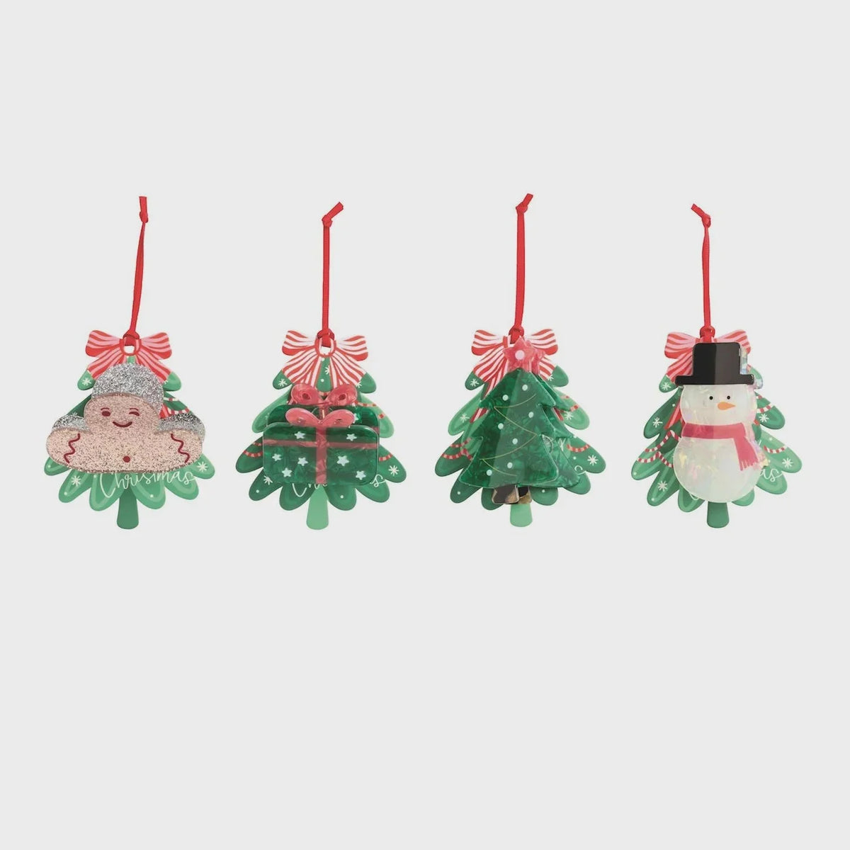Festive Christmas tree-shaped hair clips with holiday characters, perfect as holiday gift hair accessories