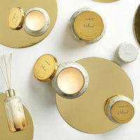 Gold and white marble Glimmer Volcano Petite Signature Jar Candle holder with modern design