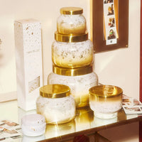 Gold and white speckled glass Glimmer Volcano Petite Signature Jar Candle with golden lids