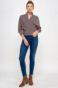 Gray soft mixed texture wrap sweater with long sleeves styled with blue jeans and brown ankle boots