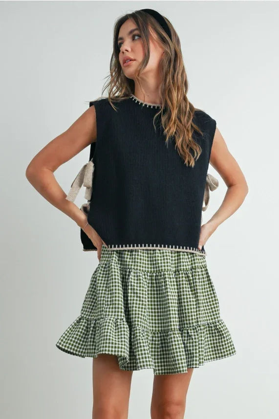 Green gingham ruffled mini skirt with mock neck sleeveless sweater
