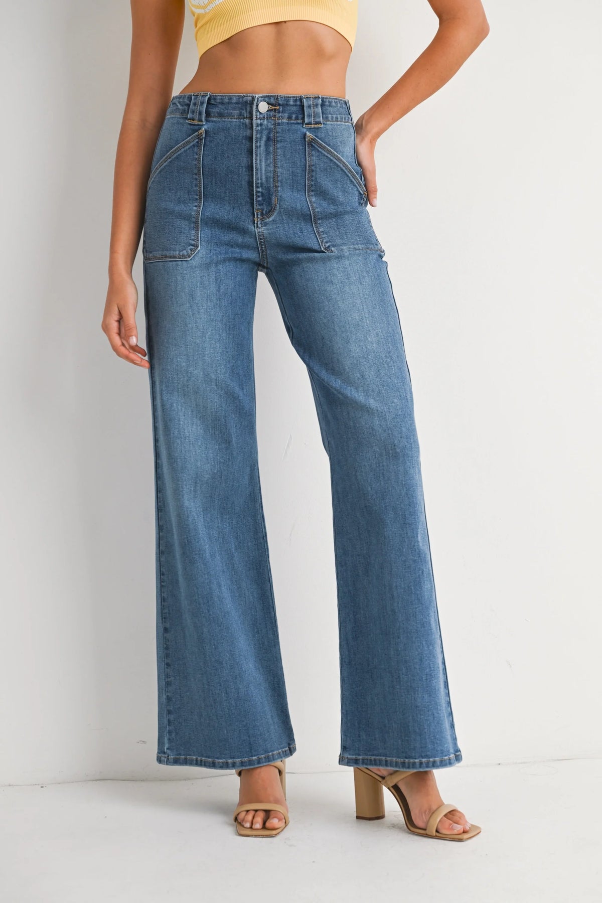 High-waisted patch pocket wide leg flare denim jeans with front patch pockets
