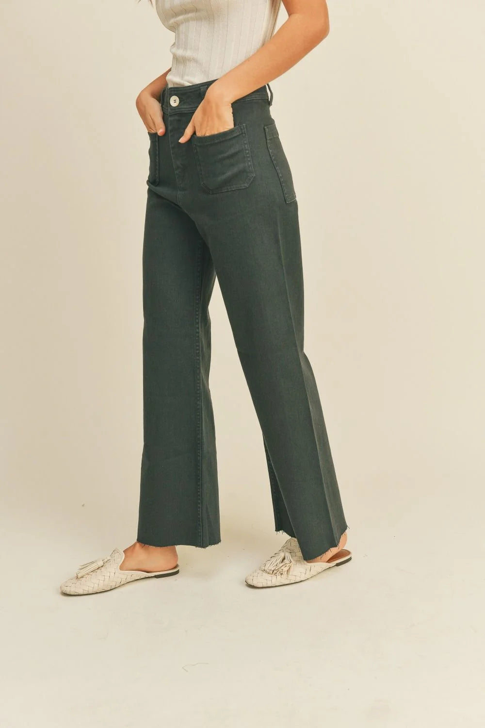Stylish wide leg dark green pants with front pockets from Daisy Lane, perfect for wide leg denim fashion