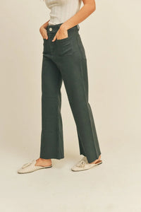Stylish wide leg dark green pants with front pockets from Daisy Lane, perfect for wide leg denim fashion