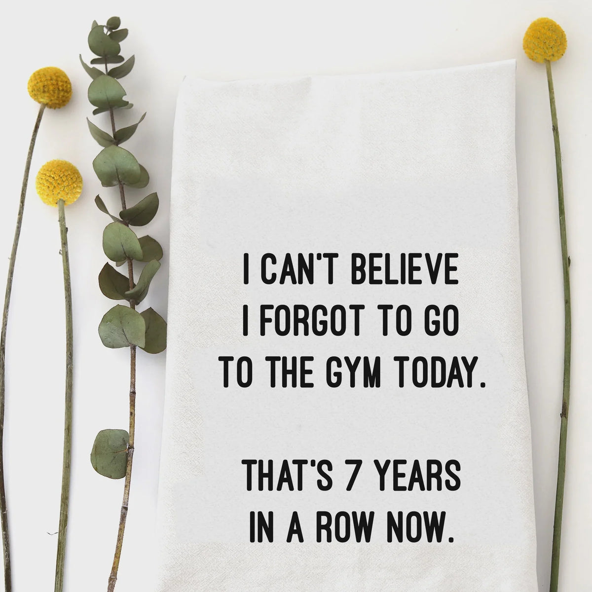 Humorous hand tea towel featuring a witty design for the gym enthusiast