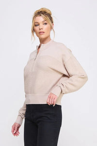 Light beige fine gauge dolman half-zip sweater with twin texture rib design