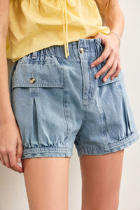 Light blue denim shorts from Pouch Pocket Denim Shorts, perfect for women’s boho chic clothing
