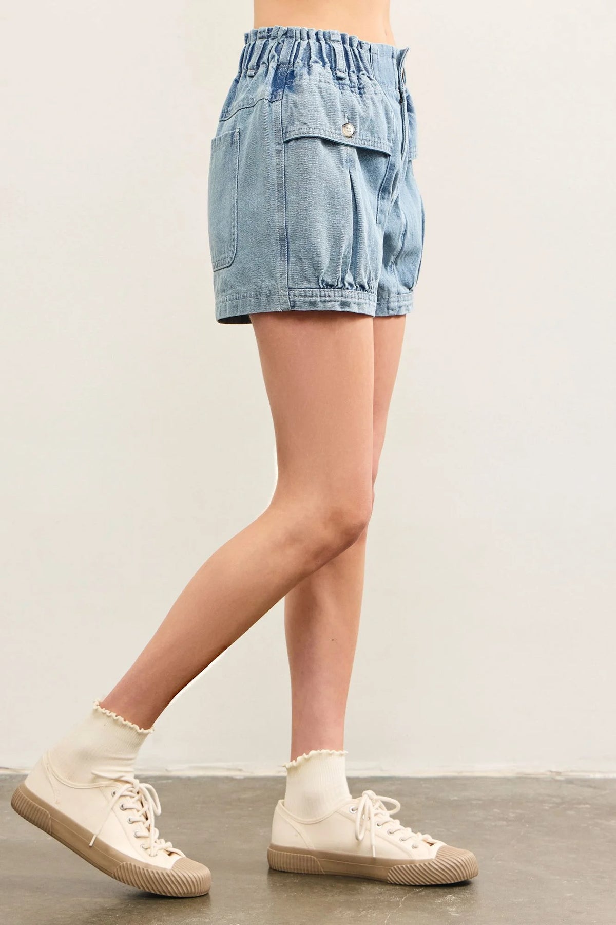 Light blue denim shorts from POUCH POCKET DENIM SHORTS, perfect for women’s boho chic clothing