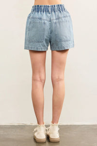 Light blue denim shorts from Pouch Pocket Denim Shorts, perfect for women’s boho chic clothing at Shop Daisy