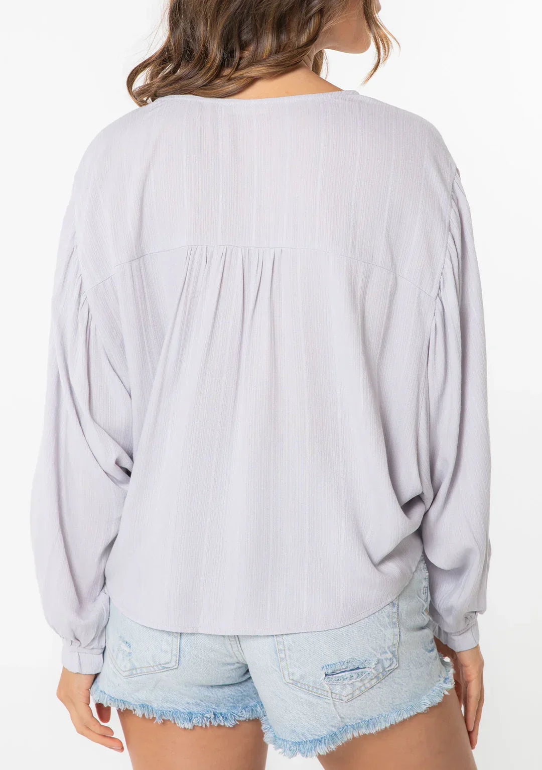 Jacquard stripe long sleeve chic kimono top paired with distressed denim shorts