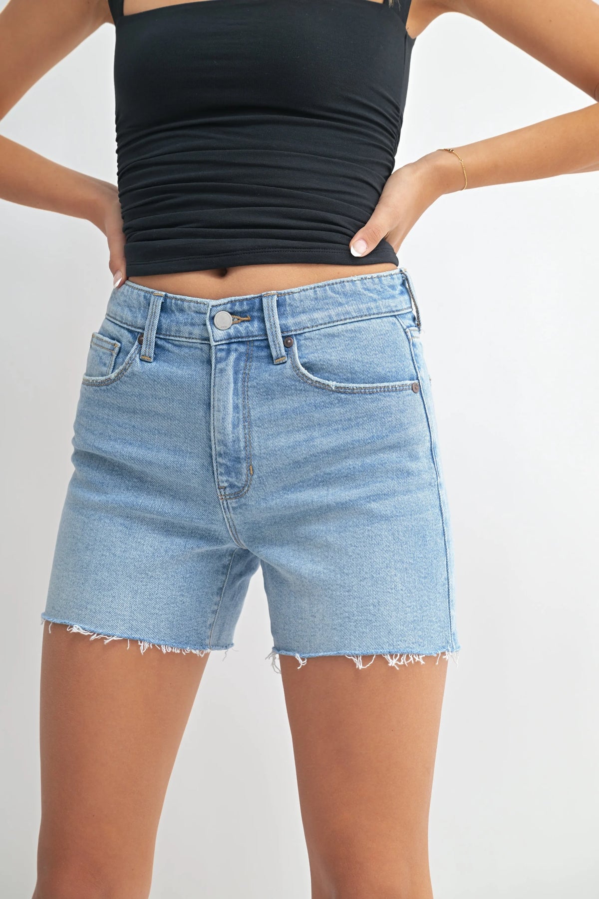Light wash denim walking shorts with a longer length for comfortable summer wear