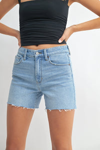 Light wash denim walking shorts with a longer length for comfortable summer wear