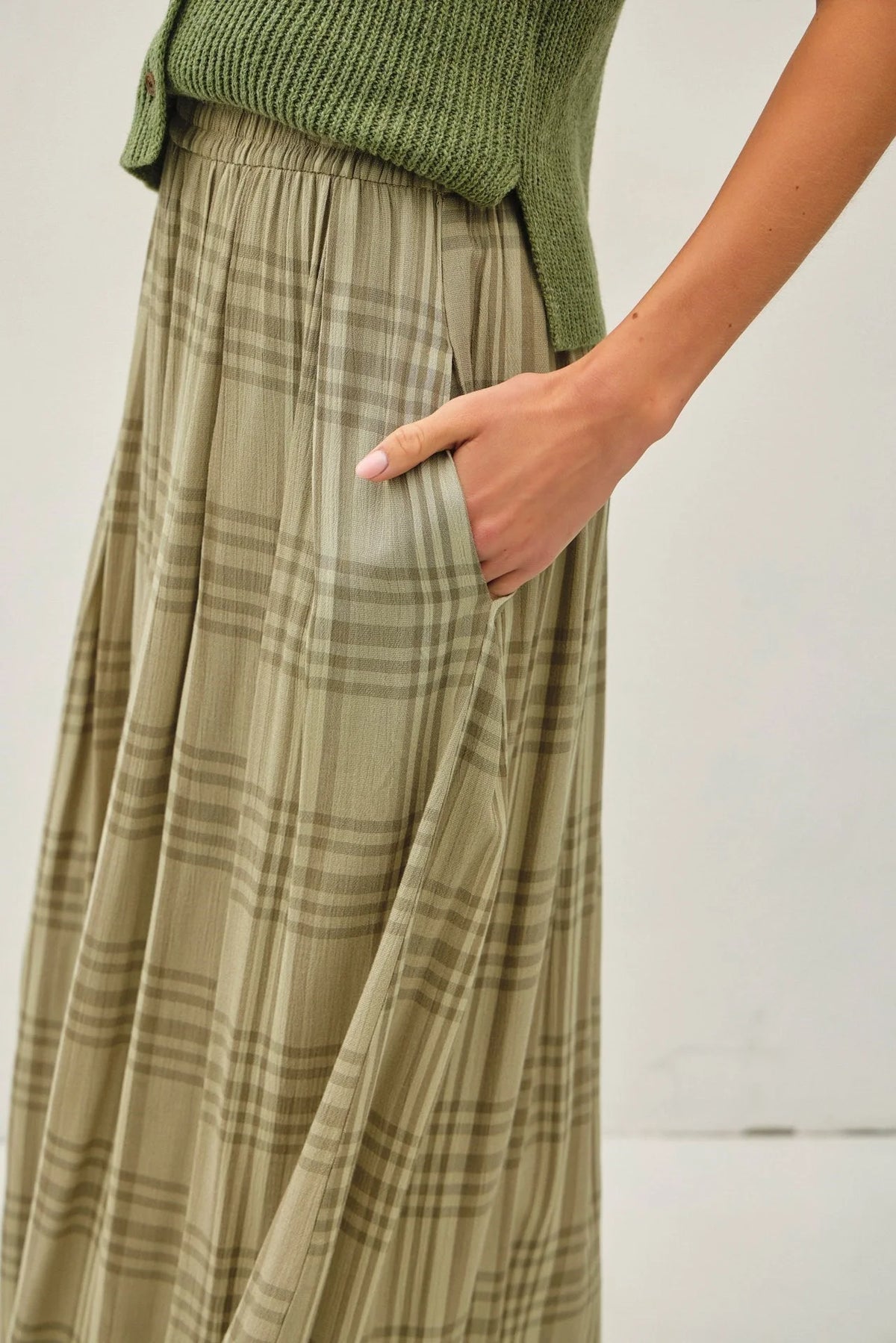 Olive green plaid printed pleats midi skirt with a pocket for stylish elegance
