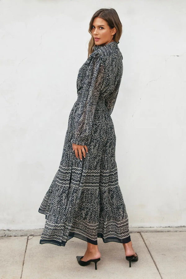 SAHARA NIGHT MAXI DRESS featuring a long-sleeved patterned maxi dress for women