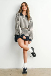 Striped collared long sleeve polo shirt with dark collar and cuffs for stylish casual wear