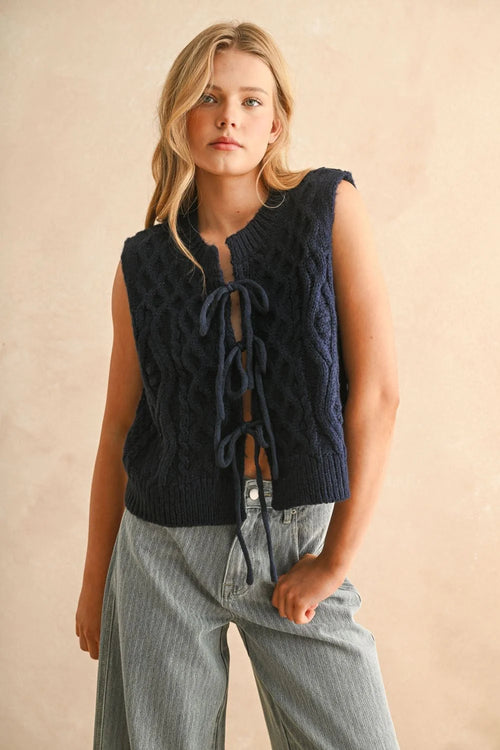 Navy blue cable knitted vest with tie-front design, stylish knitted vest for women