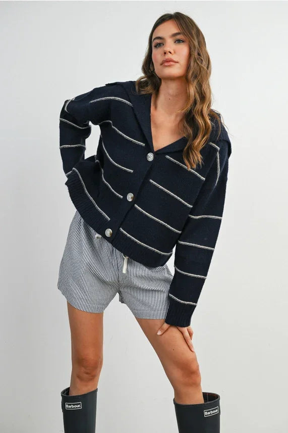 Navy blue and white striped collared cardigan with button front