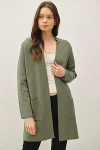 Open front classic knit coat featuring long sleeves and two patch pockets in olive green