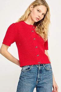 Red short-sleeved button-down cardigan from Shop Daisy, perfect for women’s boho chic clothing